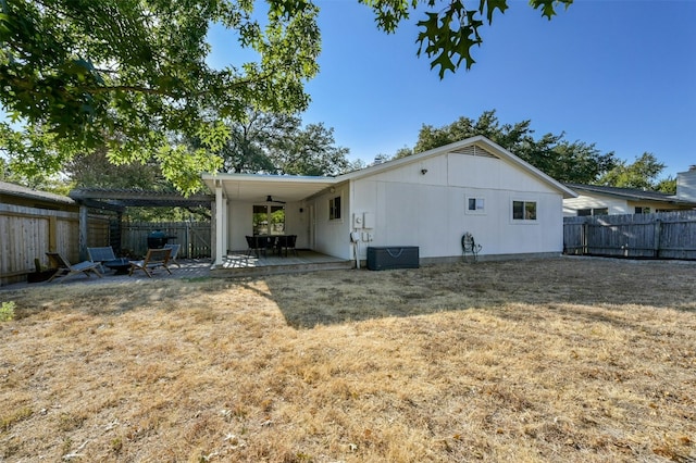 12218 Grimsley Dr, Austin, TX 78759 - back of house featuring a fenced backyard and a patio area
