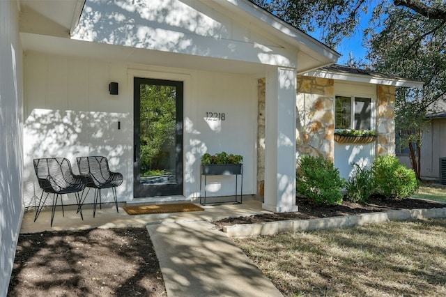 12218 Grimsley Dr, Austin, TX 78759 - doorway to property with stone siding