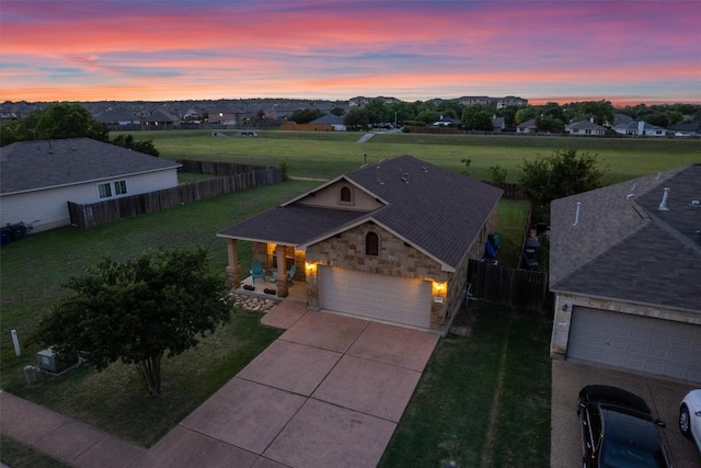 aerial view at dusk with a residential view