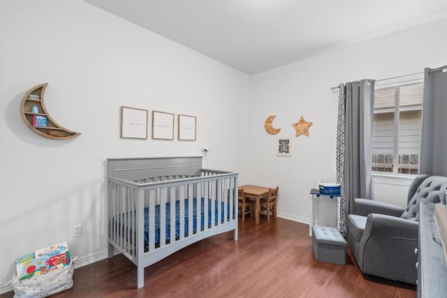 1307 Tamarac Trl, Leander, TX 78641 - bedroom featuring a crib and wood finished floors