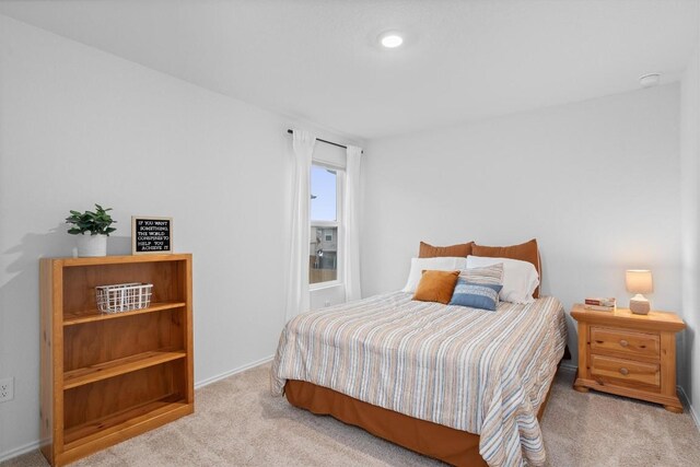 19216 Bear Grass Dr, Elgin, TX 78621 - carpeted bedroom with baseboards