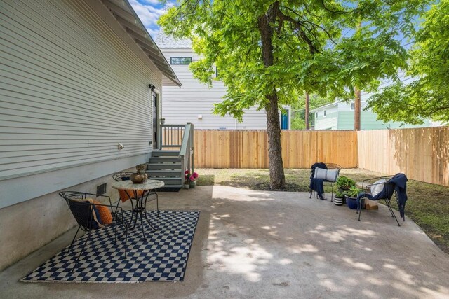 view of patio with fence