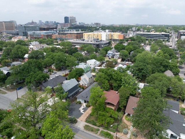 birds eye view of property featuring a view of city