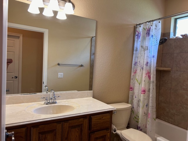 1005 Fort Davis St, Georgetown, TX 78633 - full bathroom featuring vanity, toilet, shower / bathtub combination with curtain, and a textured wall