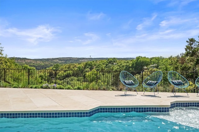 5914 Cape Coral Dr, Austin, TX 78746 - view of swimming pool with a patio