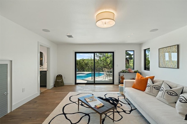 5914 Cape Coral Dr, Austin, TX 78746 - living area featuring wood finished floors and baseboards
