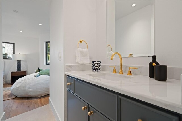 5914 Cape Coral Dr, Austin, TX 78746 - bathroom with vanity, connected bathroom, and recessed lighting