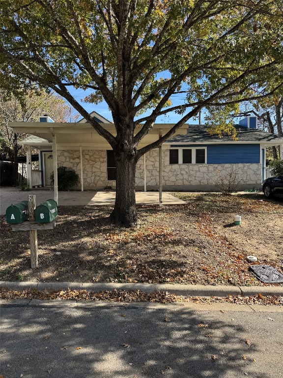 8105 Dowling Cv, Austin, TX 78745 - view of front of home featuring stone siding