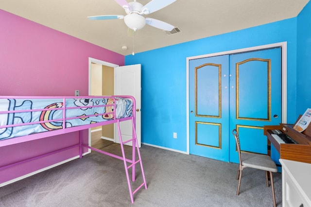 bedroom featuring carpet floors, a ceiling fan, baseboards, and visible vents