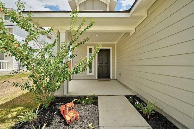 155 Lyndon Dr, San Marcos, TX 78666 - doorway to property featuring board and batten siding and a porch