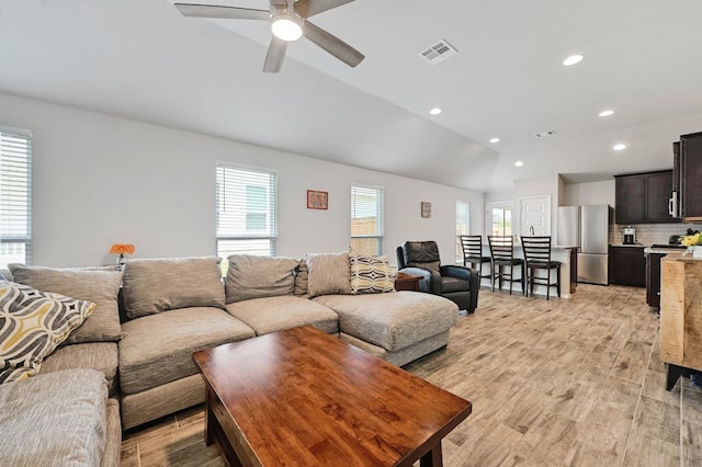 155 Lyndon Dr, San Marcos, TX 78666 - living area featuring ceiling fan, light wood finished floors, recessed lighting, vaulted ceiling, and visible vents