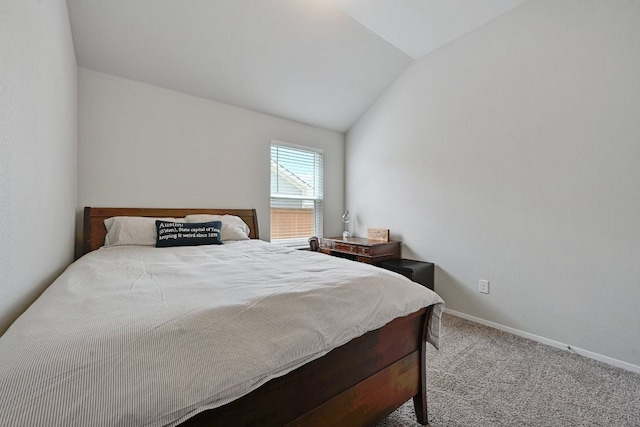 155 Lyndon Dr, San Marcos, TX 78666 - carpeted bedroom with baseboards and lofted ceiling
