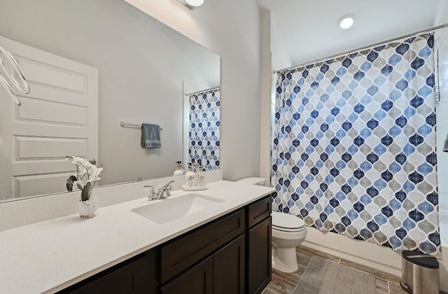 155 Lyndon Dr, San Marcos, TX 78666 - full bathroom with toilet, shower / tub combo, and vanity