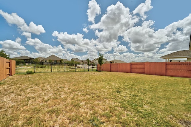 155 Lyndon Dr, San Marcos, TX 78666 - view of yard featuring a fenced backyard