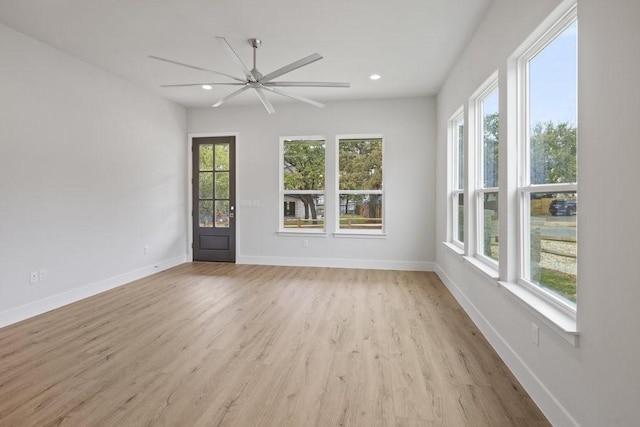 602 Shorewood Dr, Granite Shoals, TX 78654 - unfurnished room with a healthy amount of sunlight, baseboards, and light wood-style flooring