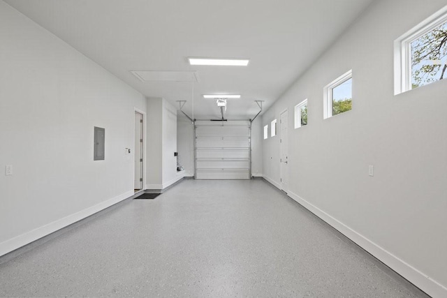 602 Shorewood Dr, Granite Shoals, TX 78654 - garage featuring baseboards and electric panel