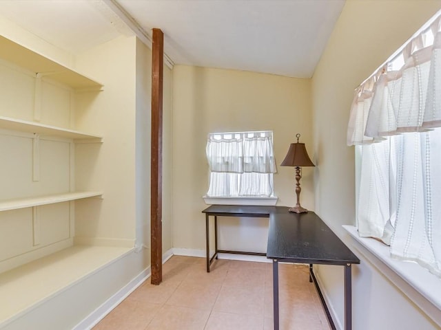 1128 W Hopkins St, San Marcos, TX 78666 - unfurnished office with healthy amount of natural light and light tile patterned flooring