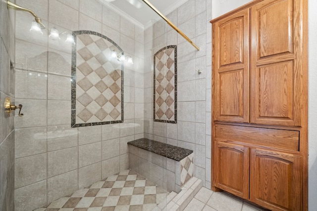 full bathroom featuring ornamental molding and a tile shower