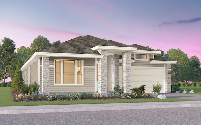 view of front of house with a garage, driveway, and stone siding