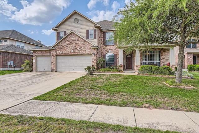 traditional-style home featuring brick siding, an attached garage, driveway, and a front lawn