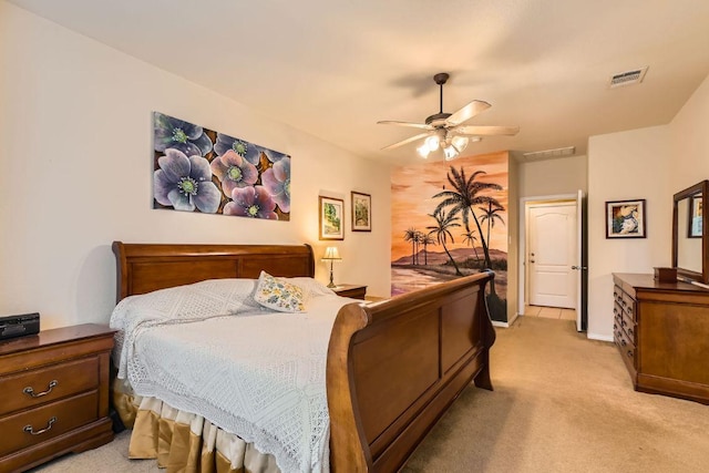 bedroom with baseboards, a ceiling fan, light colored carpet, and visible vents