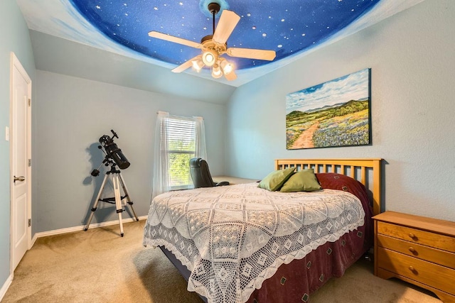 carpeted bedroom featuring baseboards, ceiling fan, and lofted ceiling