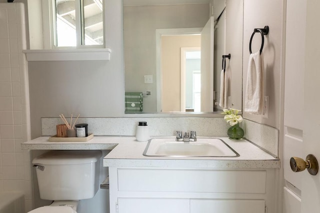 7515 Daugherty St, Austin, TX 78757 - full bath featuring vanity and toilet