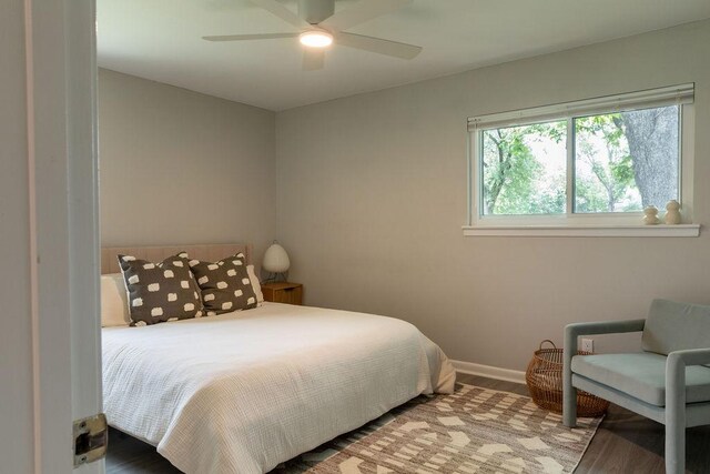 7515 Daugherty St, Austin, TX 78757 - bedroom featuring baseboards and ceiling fan