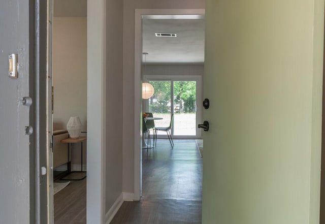 7515 Daugherty St, Austin, TX 78757 - hall with wood finished floors and baseboards