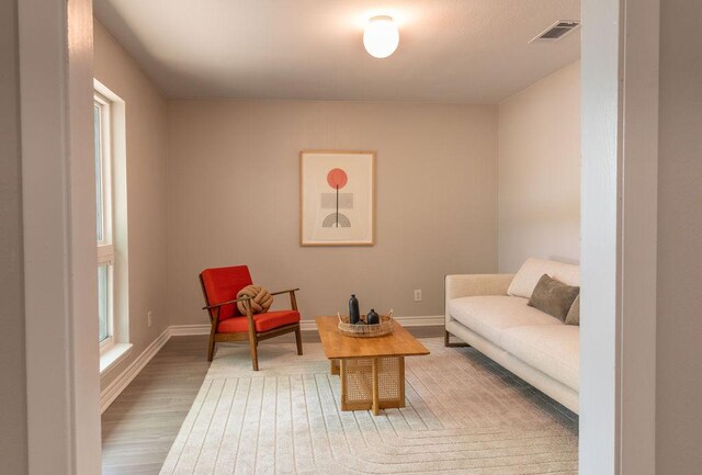 7515 Daugherty St, Austin, TX 78757 - living area featuring wood finished floors and baseboards