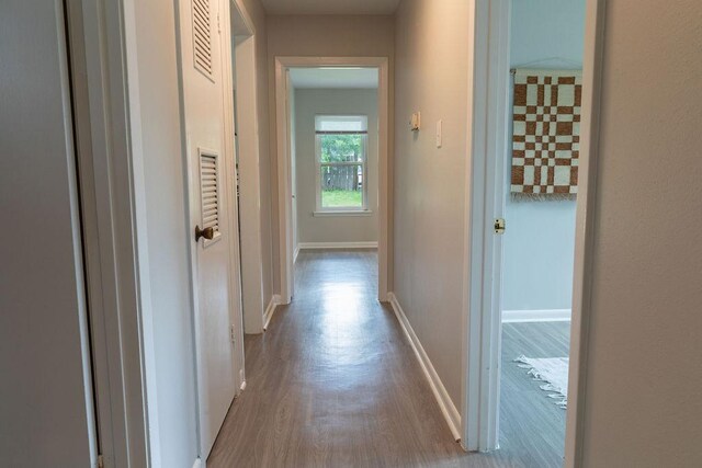 7515 Daugherty St, Austin, TX 78757 - hall with wood finished floors and baseboards