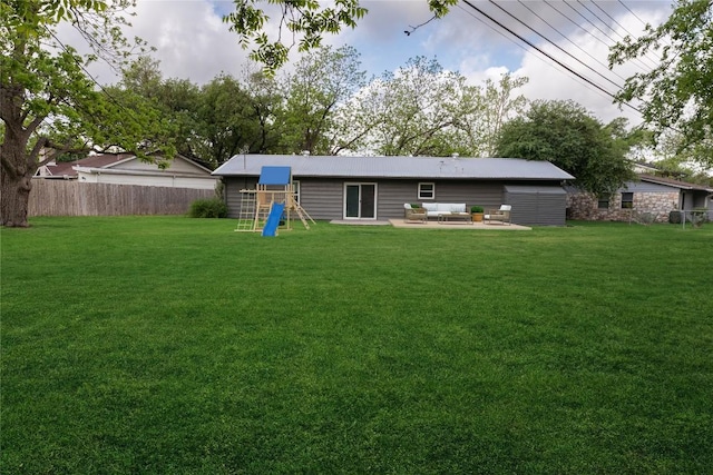 7515 Daugherty St, Austin, TX 78757 - rear view of house with an outdoor living space and a patio