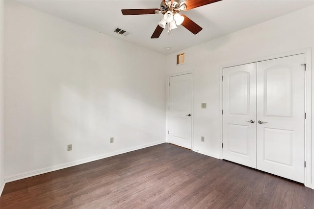 10104 Missel Thrush Dr, Austin, TX 78750 - unfurnished bedroom featuring wood finished floors, a closet, and ceiling fan