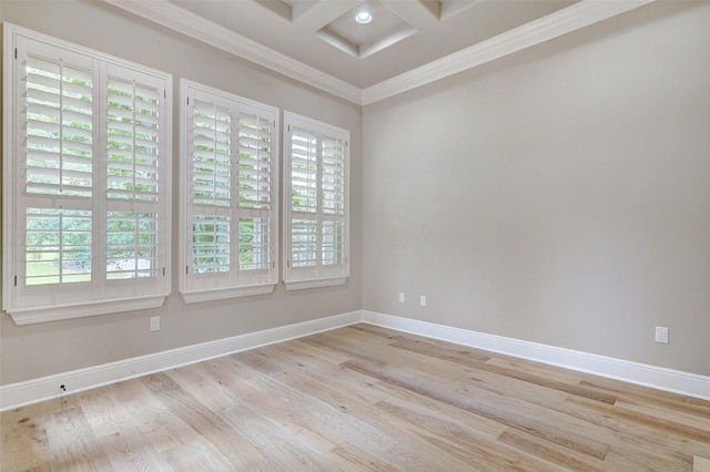 423 Bella Montagna Cir, Austin, TX 78734 - spare room featuring ornamental molding, light wood-style floors, coffered ceiling, and beam ceiling