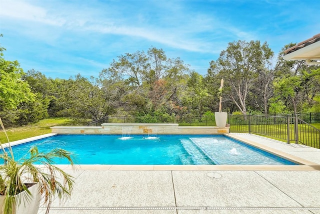 view of swimming pool featuring a fenced in pool, a lawn, fence, and a patio