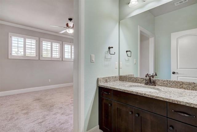 423 Bella Montagna Cir, Austin, TX 78734 - bathroom featuring ceiling fan, vanity, and crown molding