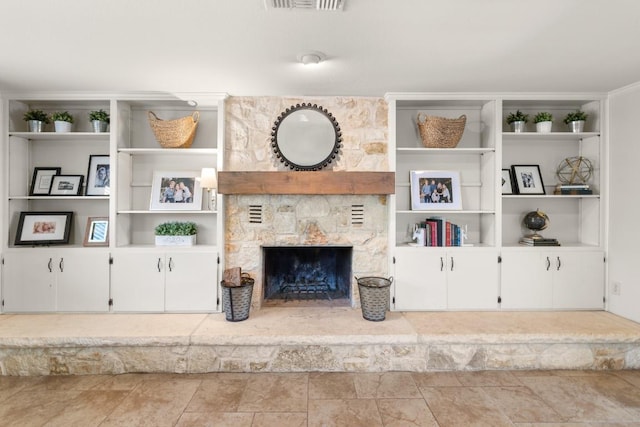 1418 Jackson Rd, Kerrville, TX 78028 - living area with a stone fireplace and visible vents