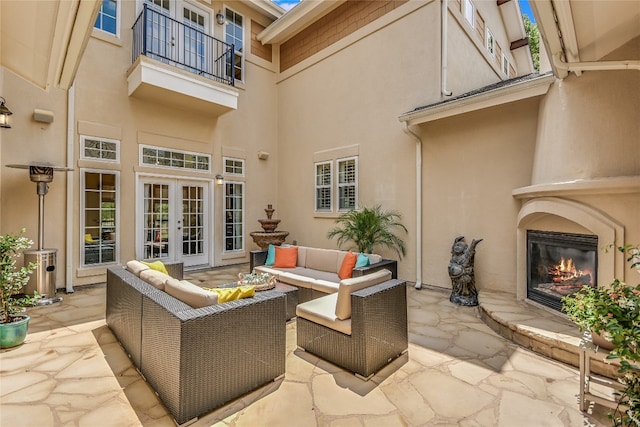 1916 Wimberly Ln, Austin, TX 78735 - view of patio / terrace featuring a balcony, french doors, and an outdoor living space with a fireplace