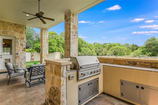 view of patio / terrace with fence, ceiling fan, grilling area, and area for grilling