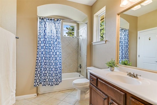 bathroom with tile patterned floors, vanity, toilet, and shower / tub combo with curtain