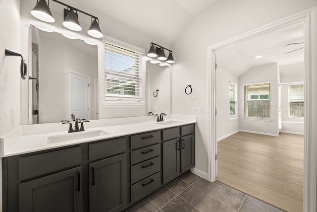 2813 Hopi Path Unit 11, Georgetown, TX 78628 - full bath featuring a sink, lofted ceiling, and a wealth of natural light