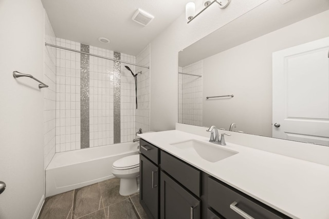 2813 Hopi Path Unit 11, Georgetown, TX 78628 - bathroom with toilet, visible vents, bathtub / shower combination, and vanity