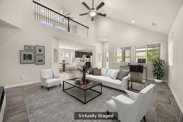 2813 Hopi Path Unit 11, Georgetown, TX 78628 - living area featuring recessed lighting, ceiling fan, baseboards, and high vaulted ceiling