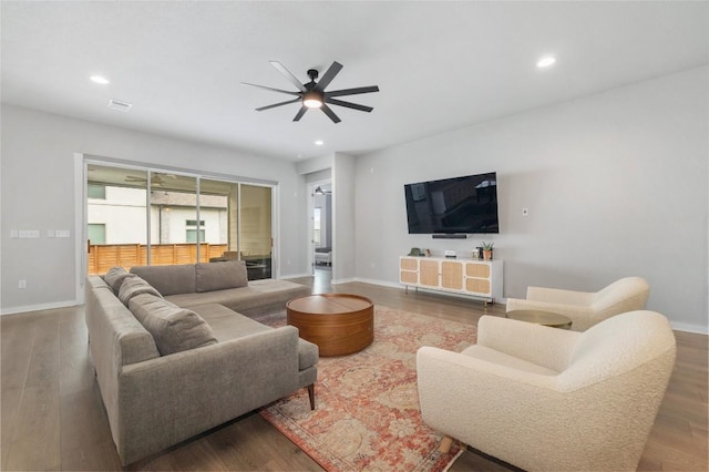 8600 Chrysler Bnd, Austin, TX 78744 - living area with baseboards, ceiling fan, recessed lighting, and wood finished floors