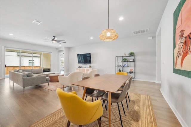 8600 Chrysler Bnd, Austin, TX 78744 - dining room with visible vents, recessed lighting, light wood-style floors, and baseboards