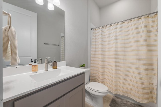 8600 Chrysler Bnd, Austin, TX 78744 - bathroom featuring vanity, tile patterned floors, toilet, and curtained shower