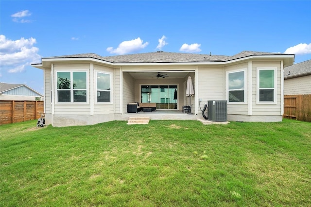 8600 Chrysler Bnd, Austin, TX 78744 - back of house with ceiling fan, central air condition unit, and a patio