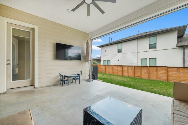 8600 Chrysler Bnd, Austin, TX 78744 - view of patio / terrace featuring a ceiling fan and a fenced backyard