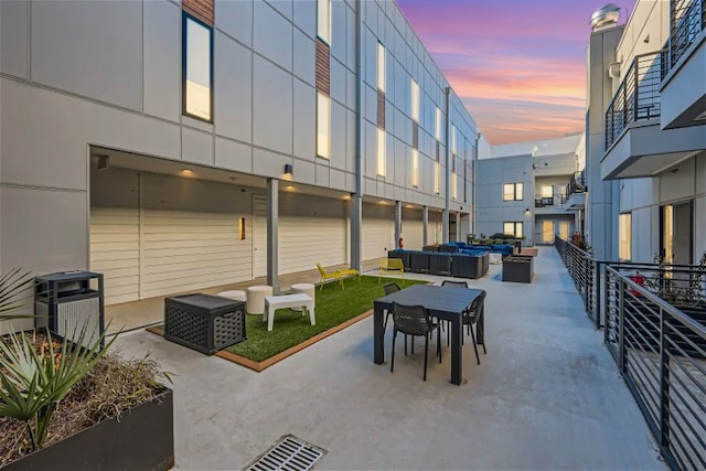 view of community featuring outdoor lounge area and a patio area