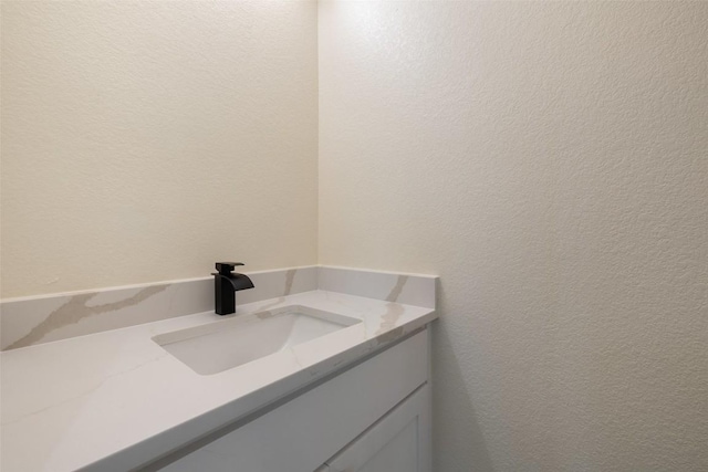 1000 Vargas Rd Unit A, Austin, TX 78741 - bathroom featuring vanity and a textured wall